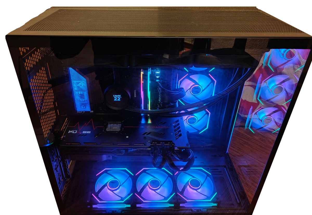 [photo of computer in black box with metal panels and rgb fans]